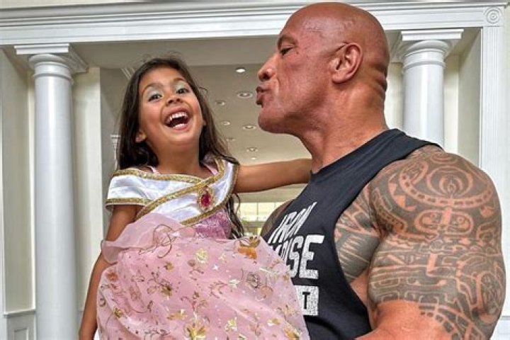 Dwayne Johnson Puckers Up, Holds Daughter, 5, During Her Princess Party